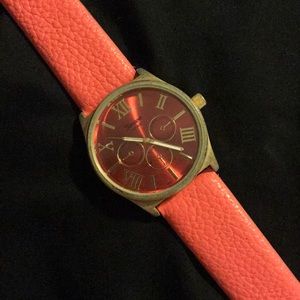 Coral and gold watch